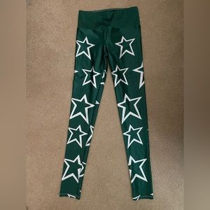 Gold sheep leggings. Size small. Green stars.